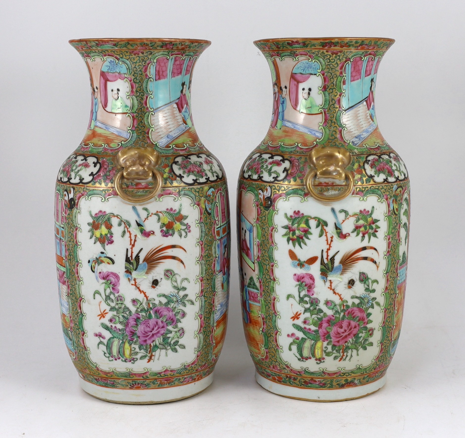 A pair of Chinese famille rose vases, 19th century, 36.5 cm high